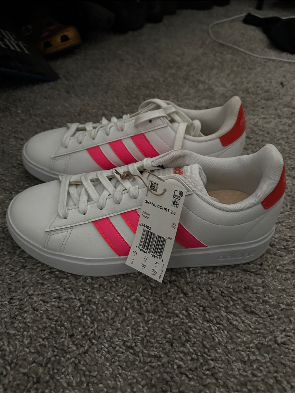 adidas Women’s White Sneakers with Hot Pink Stripes